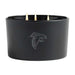 Onyx black three-wick Crate & Barrel Monochrome Scented Candle featuring an Atlanta Falcons logo on the wide glass vessel