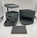 Onyx Game Theory Tables Tiered Tray set in gray displays a tiered stack of trays alongside a storage unit