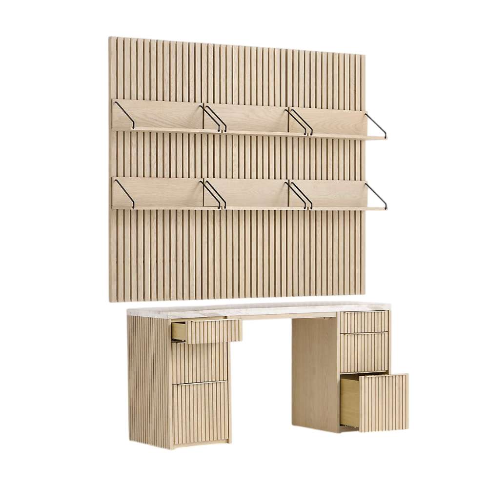 Open drawers and six wall-mounted shelves showcase the storage options of Crate & Barrel Batten 62" White Oak Wood Desk with White Marble Top and Panel Set with 6 Reversible Shelves