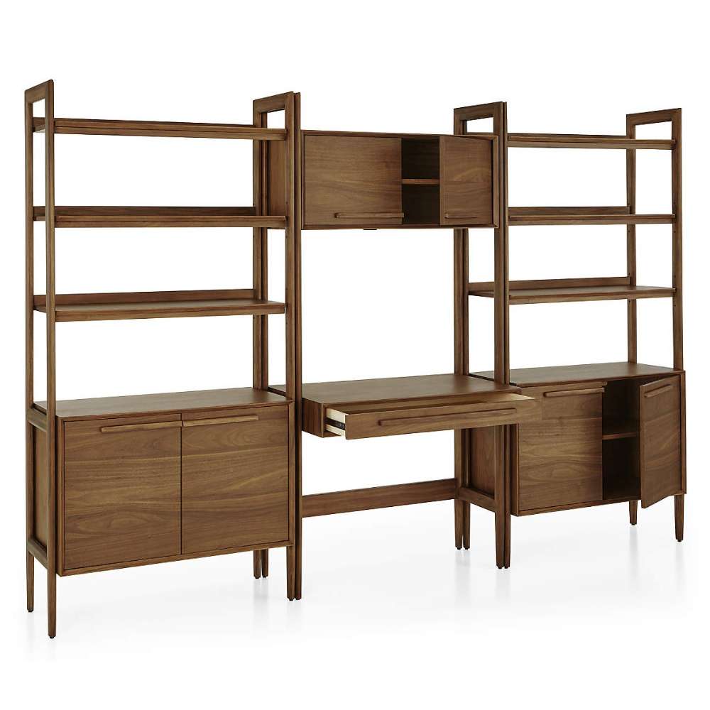 Open storage view of Crate & Barrel Tate 108" Walnut Bookcase Desk with Outlet Set, showing cabinet interiors, shelving, and a pull-out desk drawer