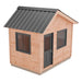 Outdoor Living Today 12×8 Saltbox Studio Outdoor Office is shown as a small cedar shed with a slanted black metal roof, windows, and a single door from an angled view