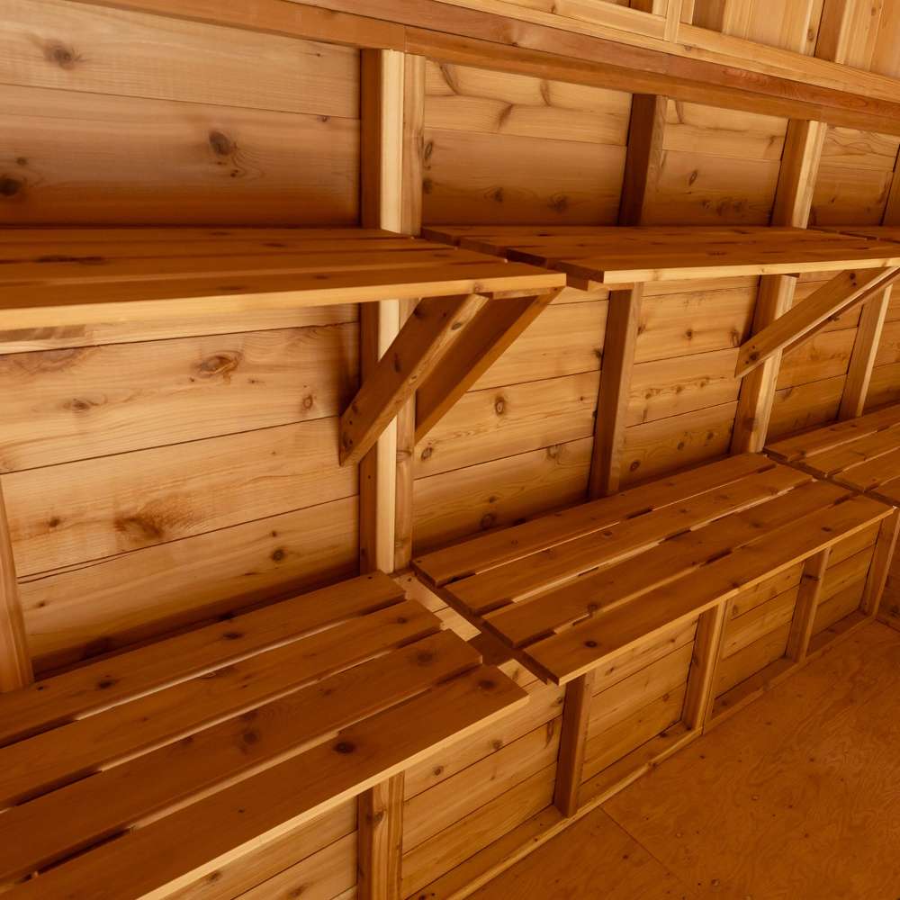 Outdoor Living Today 6ft Western Red Cedar Shed Shelves (Set of 3) are installed along the walls of a cedar shed