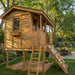 Outdoor Living Today 7x9 Cozy Cabin Signature Cedar Playhouse & Sandbox with cedar siding, porch entry, ladder, and angled climbing wall
