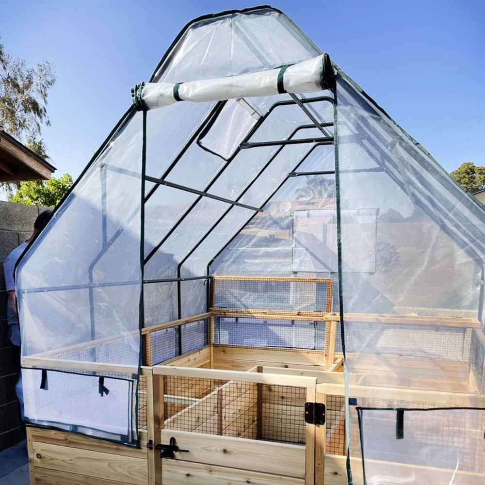 Outdoor Living Today 8×16 Raised Garden Bed is protected by a clear greenhouse-style plastic cover over a sturdy A-frame structure