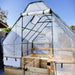 Outdoor Living Today 8×16 Raised Garden Bed is protected by a clear greenhouse-style plastic cover over a sturdy A-frame structure