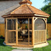 Outdoor Living Today Western Red Cedar Octagon Bayside Gazebo with a screen kit features a door and enclosed panels in a backyard setting