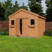 Outdoor Living Today 12×12 Double Door Space Master Storage Shed stands in a grassy backyard with its double doors partly open