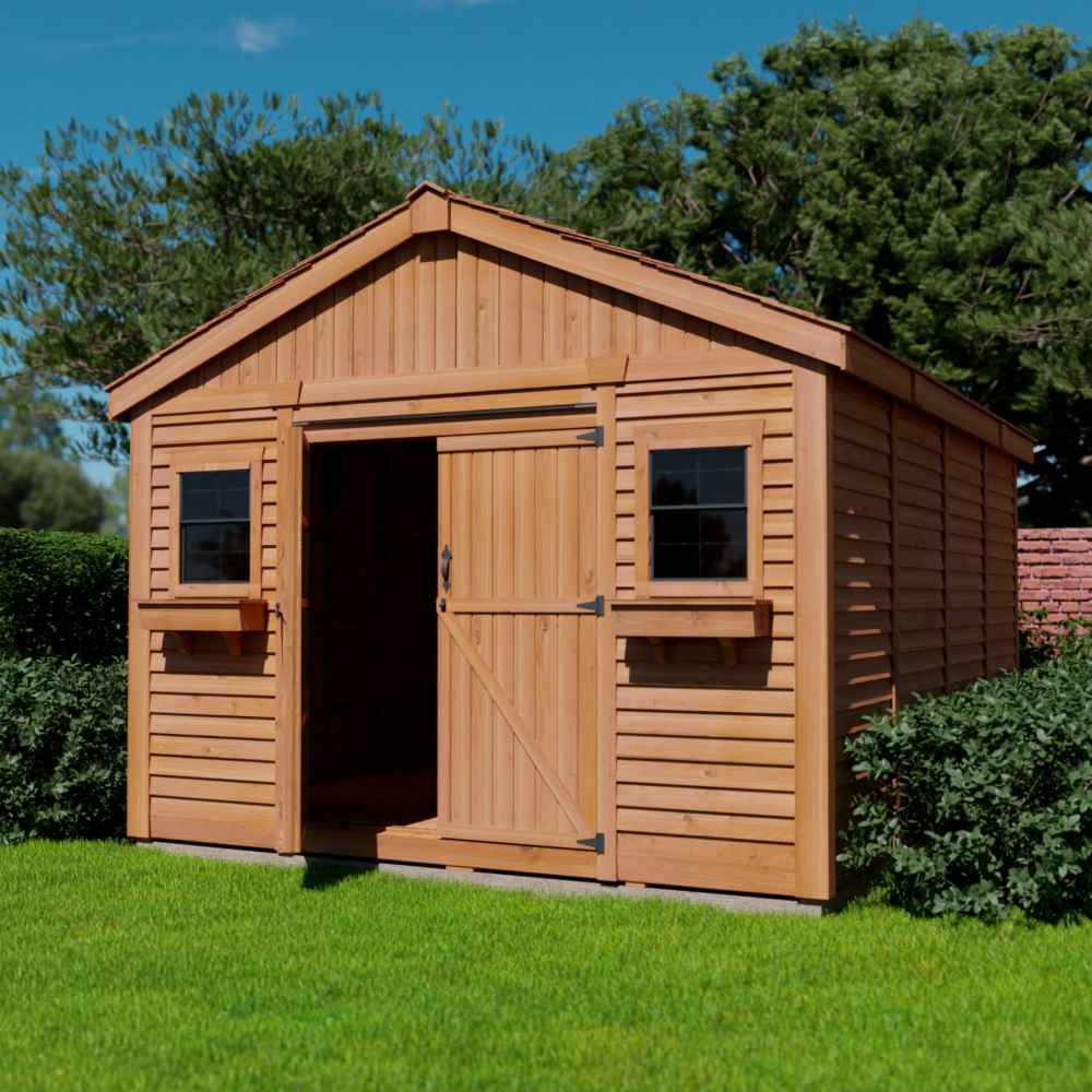 Outdoor Living Today 12×16 Double Door Space Master Storage Shed is shown with one door open and framed by lush hedges and green grass, ideal for garden settings