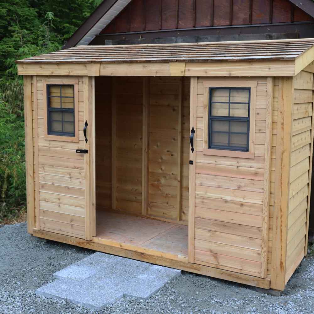 Outdoor Living Today 12×4 with Sliding Doors SpaceSaver Storage Shed shows both sliding doors open, revealing the empty wooden interior