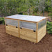 Outdoor Living Today 6×3 Raised Garden Bed covered with a transparent greenhouse-style lid to protect plants from weather while keeping warmth inside