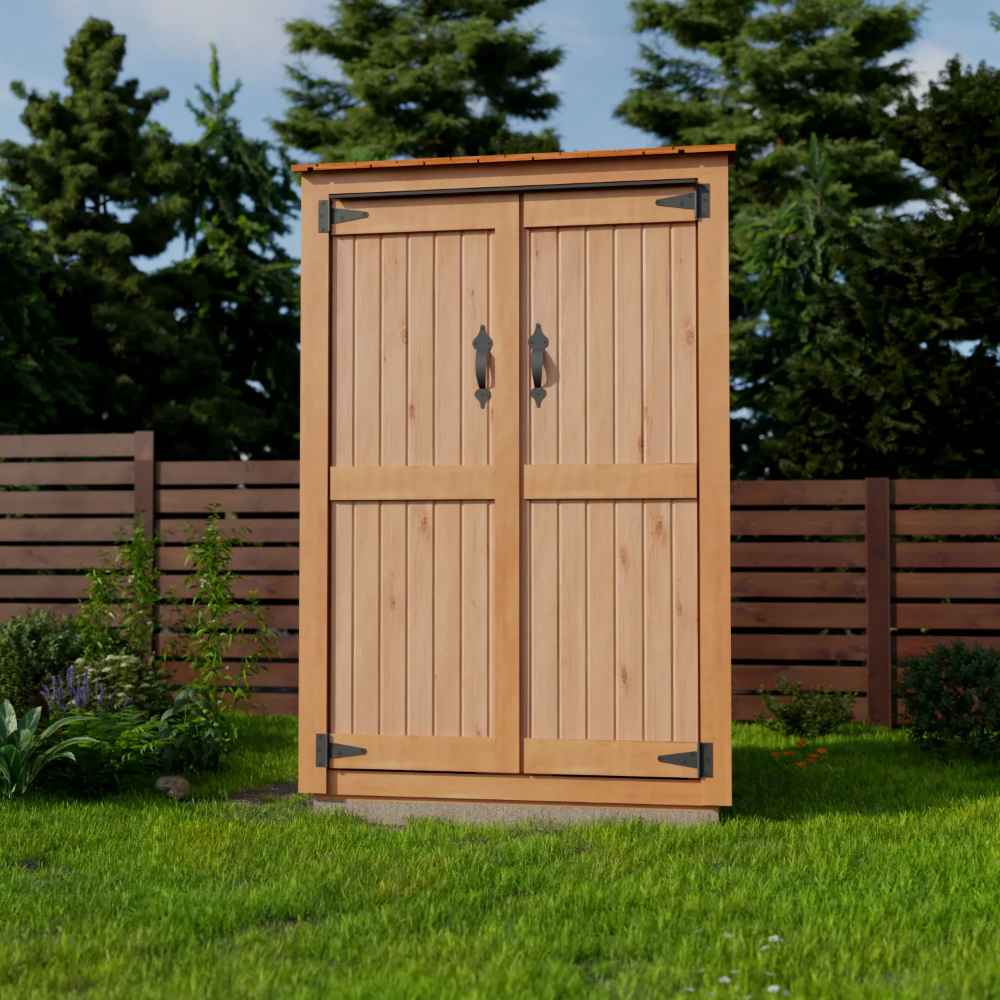 Outdoor Living Today Garden Chalet stands neatly on a grassy area, featuring closed wooden doors accented by black hardware and set against a backdrop of trees