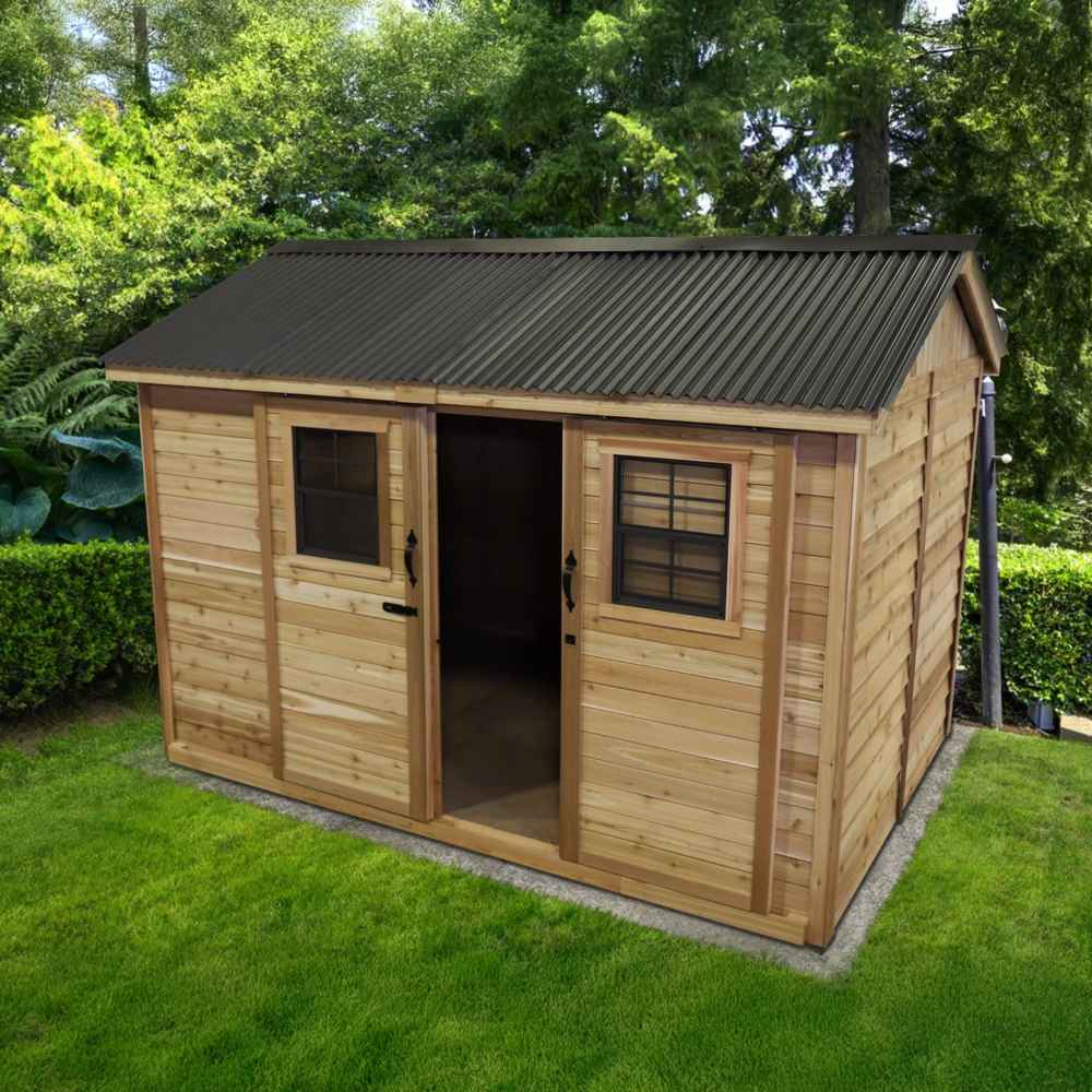 Outdoor Living Today Large 12×8 Cabana Garden Shed features a dark metal roof, sliding door, two windows, and an open door surrounded by lush greenery