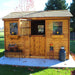 Outdoor Living Today Large 12×8 Cabana Garden Shed features a half-open split door, two windows with flower boxes, and rustic outdoor decor in front