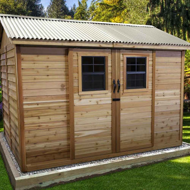 Outdoor Living Today Large 12×8 Cabana Garden Shed is shown fully closed with matching double doors, square paned windows, and a neatly framed gravel foundation