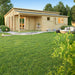 A bright and welcoming exterior photo shows the front porch, entry doors, and lush garden surrounding the GardenHouse24 USA Pamplona 70 Garden Room