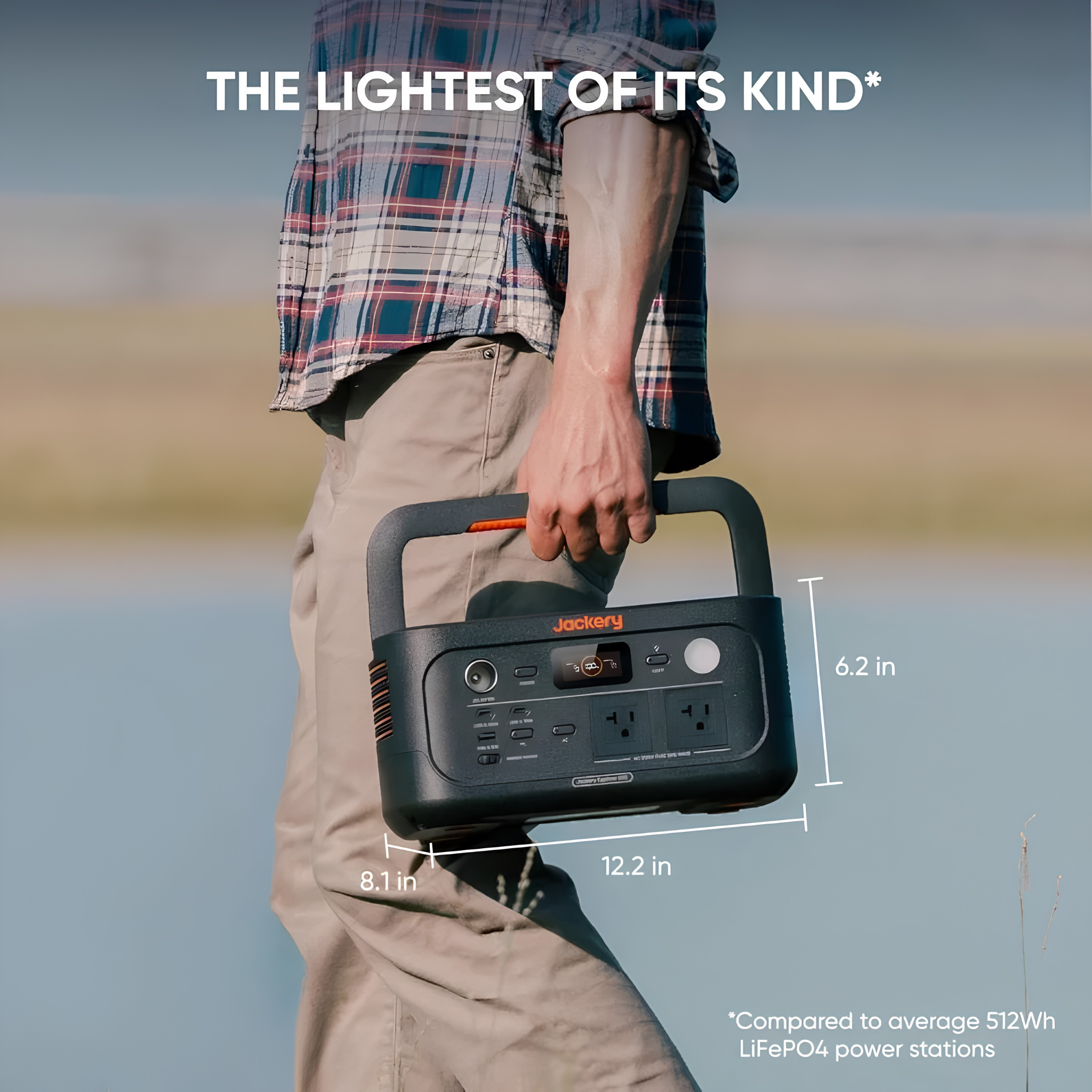 Person carries Jackery Explorer 500 v2 Portable Power Station outdoors, showing its lightweight and compact size for easy transport
