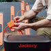 Person connects Jackery Solar Panel Connector to multiple solar panel cables before charging a portable power station