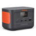Perspective view of Jackery Explorer 100 Plus Portable Power Station with Mini Carrying Bag featuring its compact design and front charging ports