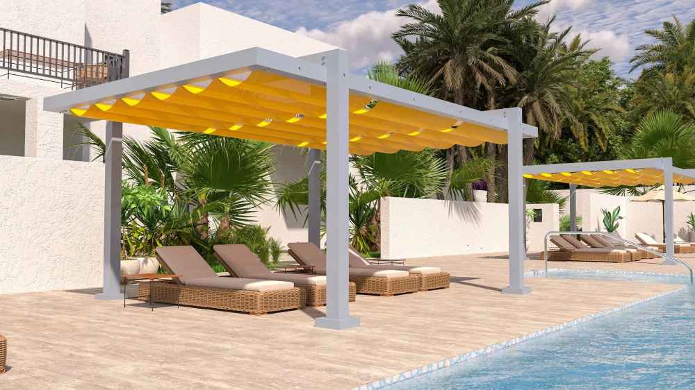 Poolside loungers rest under the bold yellow canopy of a Structureworks Balance Trex Pergola