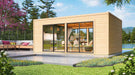 Positioned beside a lake with garden seating, the GardenHouse24 USA Ramsay 70 A ALU Garden Room shines in sunlight with its glass facade and wooden exterior