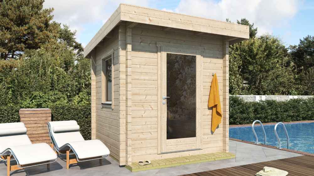 Positioned on a poolside patio, the GardenHouse24 USA Sauna Li 90 Garden Room features a sleek modern wood finish with a yellow towel hanging on its glass door