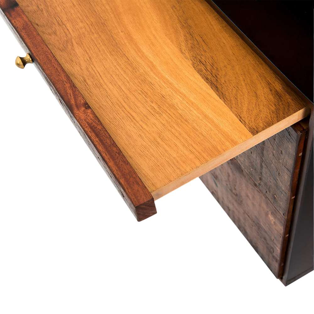 Pull-out keyboard tray extends from Crate & Barrel Sedgwick Solid Acacia Wood Desk with Storage, revealing a smooth solid wood work surface