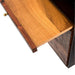 Pull-out keyboard tray extends from Crate & Barrel Sedgwick Solid Acacia Wood Desk with Storage, revealing a smooth solid wood work surface