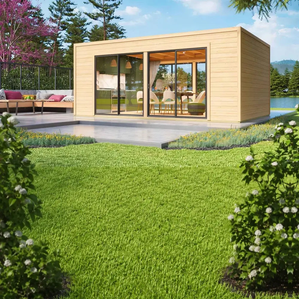 Positioned beside a lake with garden seating, the GardenHouse24 USA Ramsay 70 A ALU Garden Room shines in sunlight with its glass facade and wooden exterior