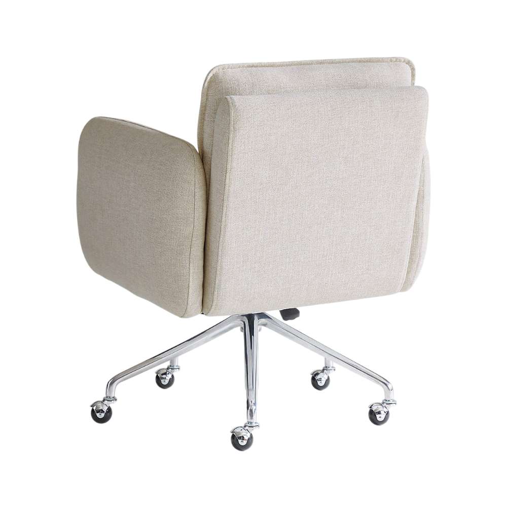 Rear view of Crate & Barrel Jens Plush Ivory Office Chair showing its plush ivory upholstery, cushioned backrest, and chrome swivel base with casters