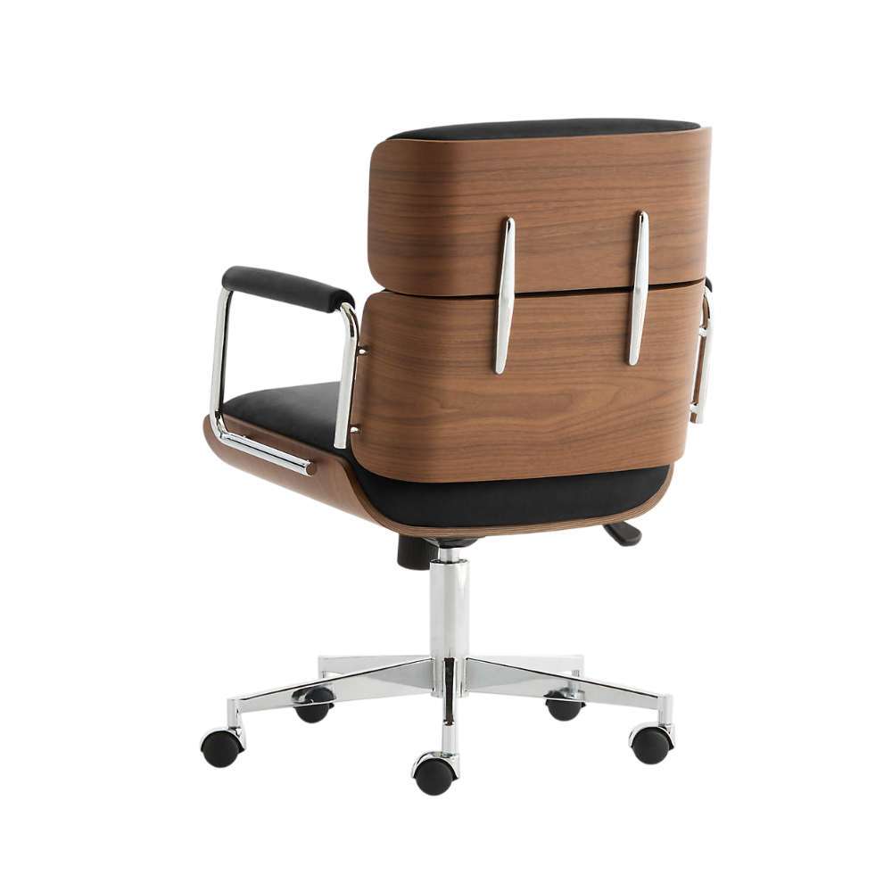 Rear view of Crate & Barrel Palmer Upholstered and Wood Paneled Office Chair with black leather upholstery, walnut wood panels, and chrome accents