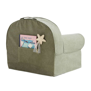 Rear view of Cyprus Green Crate & Barrel Organic Cotton Kids Lounge Nod Chair showing a top carry handle and a storage pocket holding books