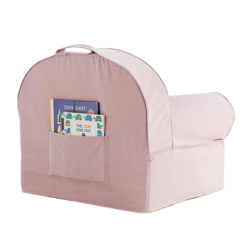 Rear view of Lilac Mauve Crate & Barrel Organic Cotton Kids Lounge Nod Chair showing a carry handle and a large pocket holding children's books