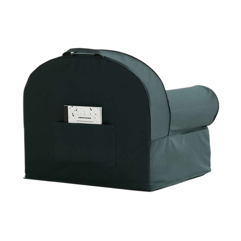 Rear view of Spruce Green Crate & Barrel Organic Cotton Kids Lounge Nod Chair with a top carry handle and a large storage pocket holding a book