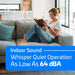 Relaxed woman reading a book on a gray sofa highlights the low indoor sound level of the ACiQ 24000 BTU Essentials 23 SEER2 2 Zone Wall Mount Mini Split Heat Pump System