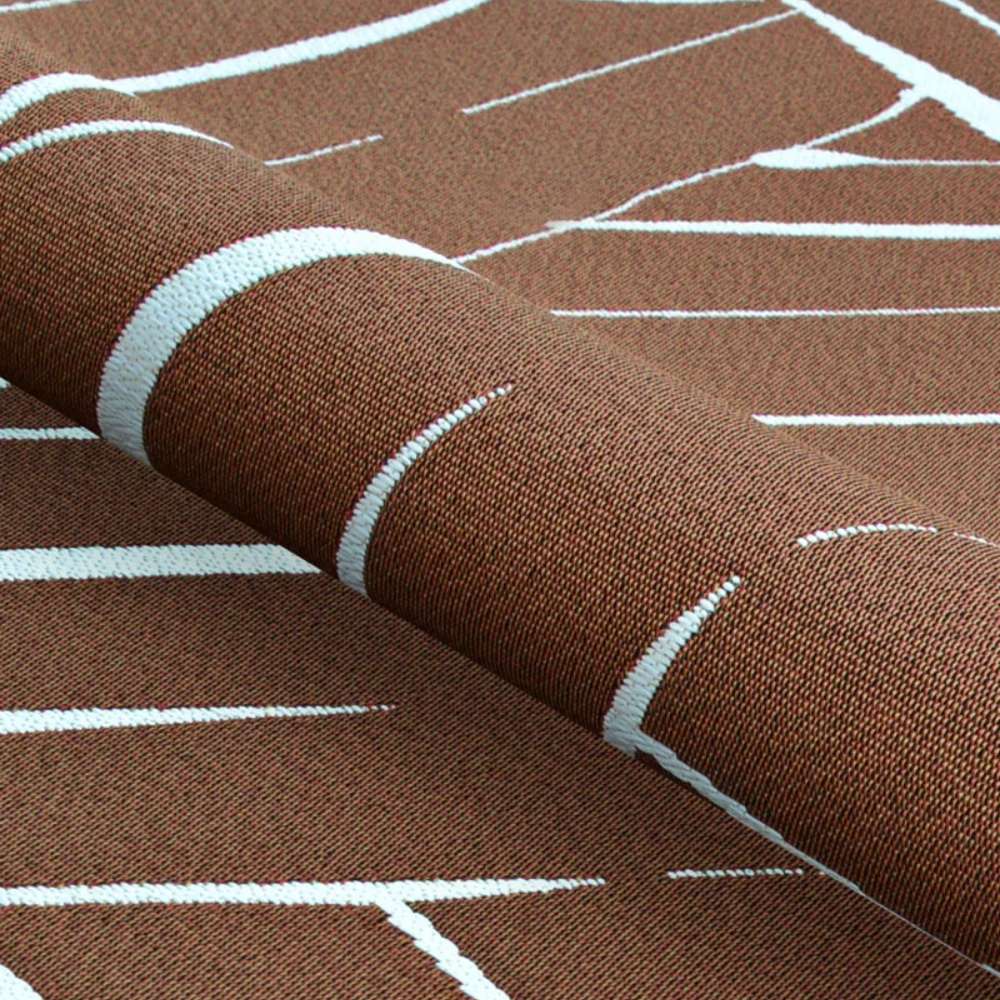 Rolled-up edge of Couristan Dolce Indoor/Outdoor Rug - Parquet/Amber displays its thick weave and abstract linear design
