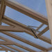 Roof close-up displays strong beams and a vent system in Outdoor Living Today Western Red Cedar Greenhouse Kit for airflow