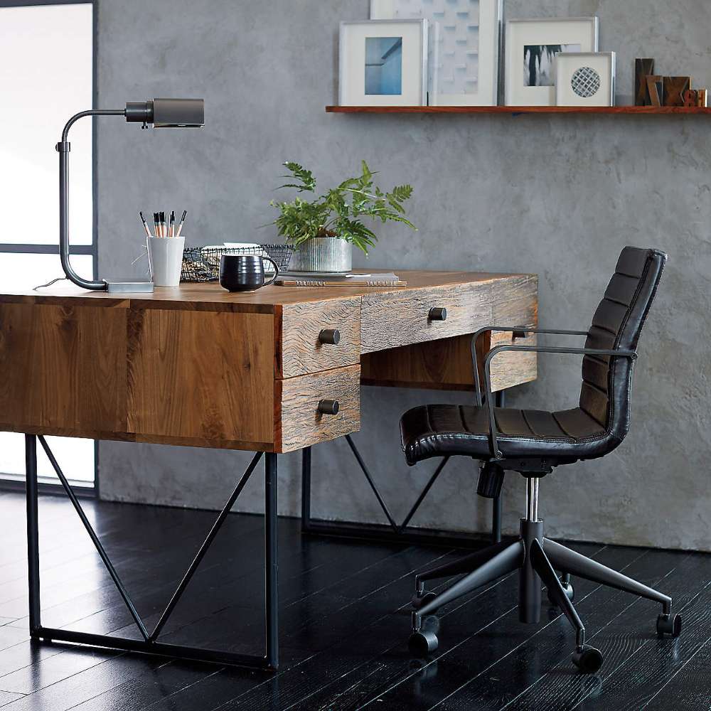 Rustic wood desk paired with Crate & Barrel Graham Black Office Chair in a modern home office
