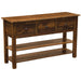 Rustic wooden Fireside Lodge Barnwood Console Table with Shelves featuring three small drawers on top and two long open shelves below