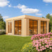 A stylish wooden cube-shaped GardenHouse24 USA Sauna Dolce 70 Garden Room with large glass sliding doors sits in a lush garden