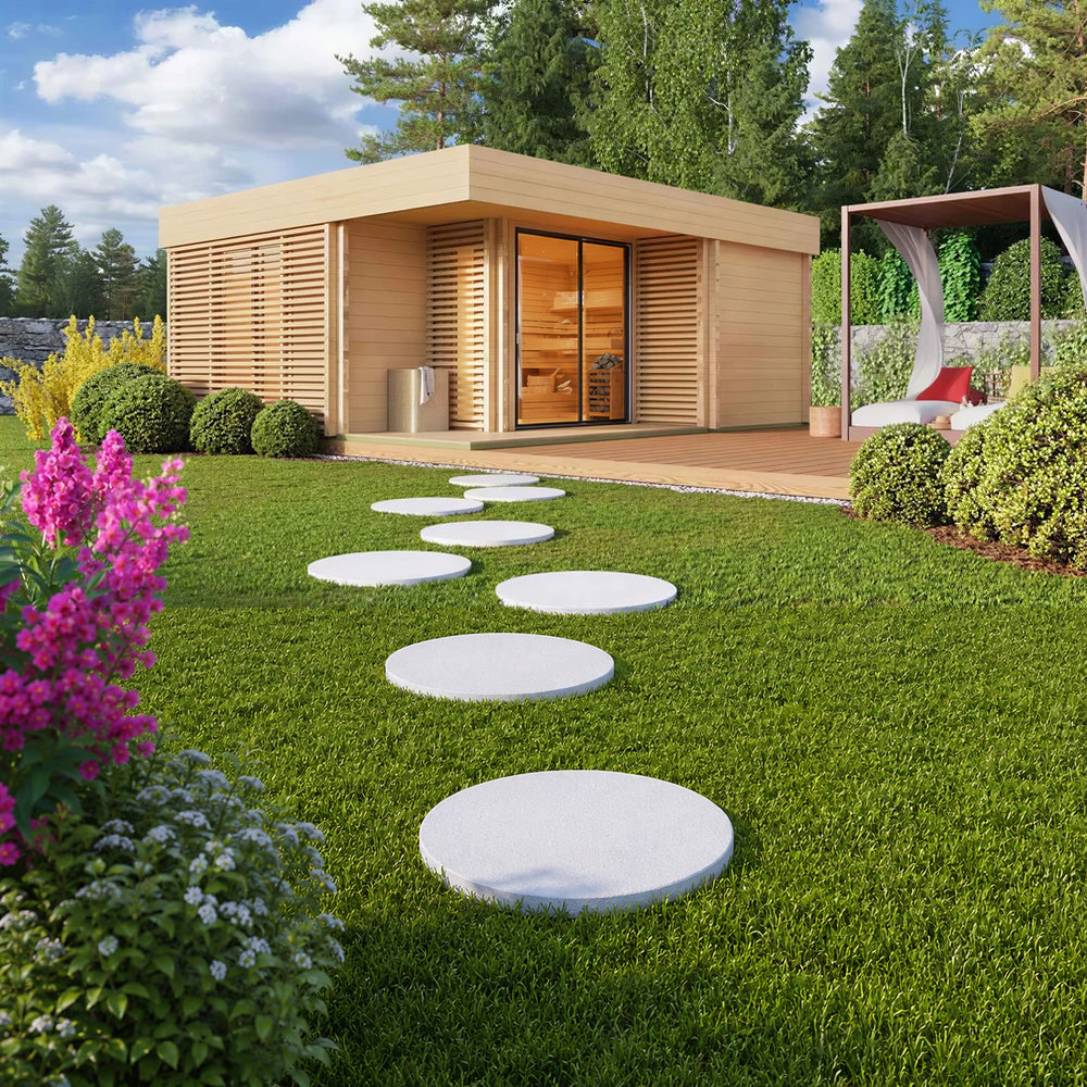 GardenHouse24 USA Sauna Giocoso 70 Garden Room is a stylish wooden garden house with horizontal slats and a cozy interior, surrounded by vibrant flowers