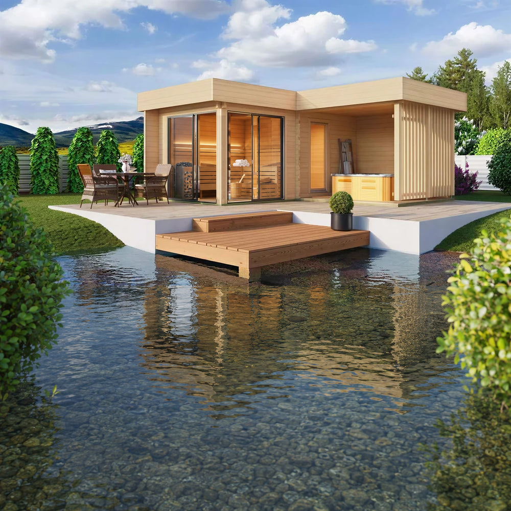 GardenHouse24 USA Sauna Piano 70 Garden Room is set beside a small pond, featuring an inviting patio with outdoor seating and warm interior lighting