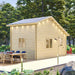 Sawmill Structures BlueWater Bungalow 160 Garden Room stands on a landscaped deck