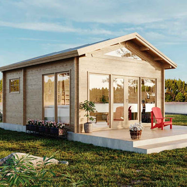 Sawmill Structures Edwin Lake House 70MM Garden Room sits gracefully in an open green area with a red chair on the porch and floor-to-ceiling windows