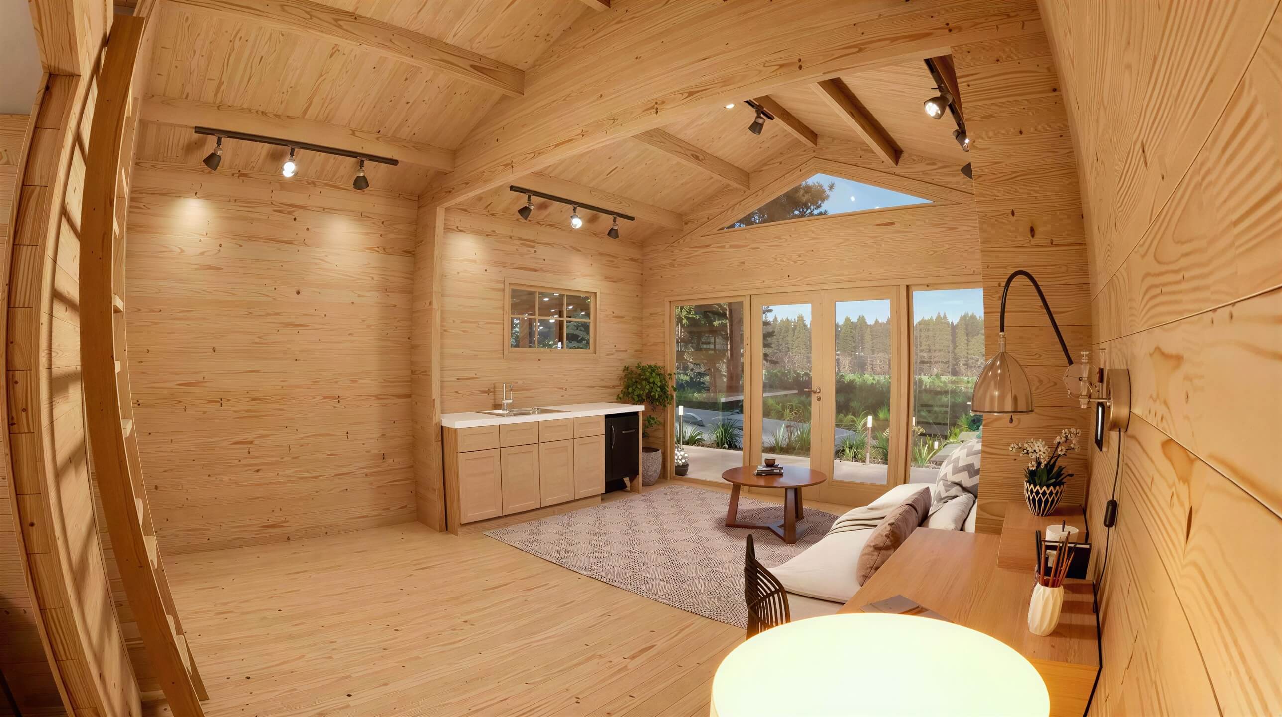 Sawmill Structures Edwin Lake House PLUS 70MM Garden Room showcases a warm, open interior with a kitchenette, natural wood finishes, and a full view of the deck