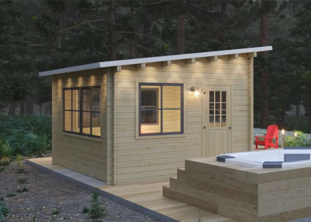 Sawmill Structures Eze Breeze Sunroom Cabin stands in a forest clearing