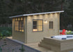 Sawmill Structures Eze Breeze Sunroom Cabin stands in a forest clearing