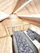 Sawmill Structures Ontario Grand Loft 107 SD Garden Room features a bright loft bedroom with sloped ceilings and a wooden railing overlooking the space below