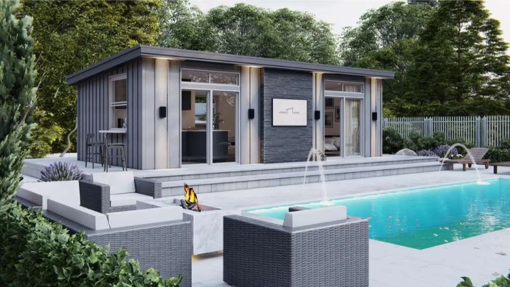 Sawmill Structures The Muskoka Garden Suites showcases a modern guest suite with large glass doors facing a sparkling pool and outdoor seating area
