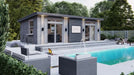 Sawmill Structures The Muskoka Garden Suites showcases a modern guest suite with large glass doors facing a sparkling pool and outdoor seating area