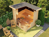 Sawmill Structures Versa Sauna is shown from above, revealing its wooden benches, heater placement, and bright, open interior design